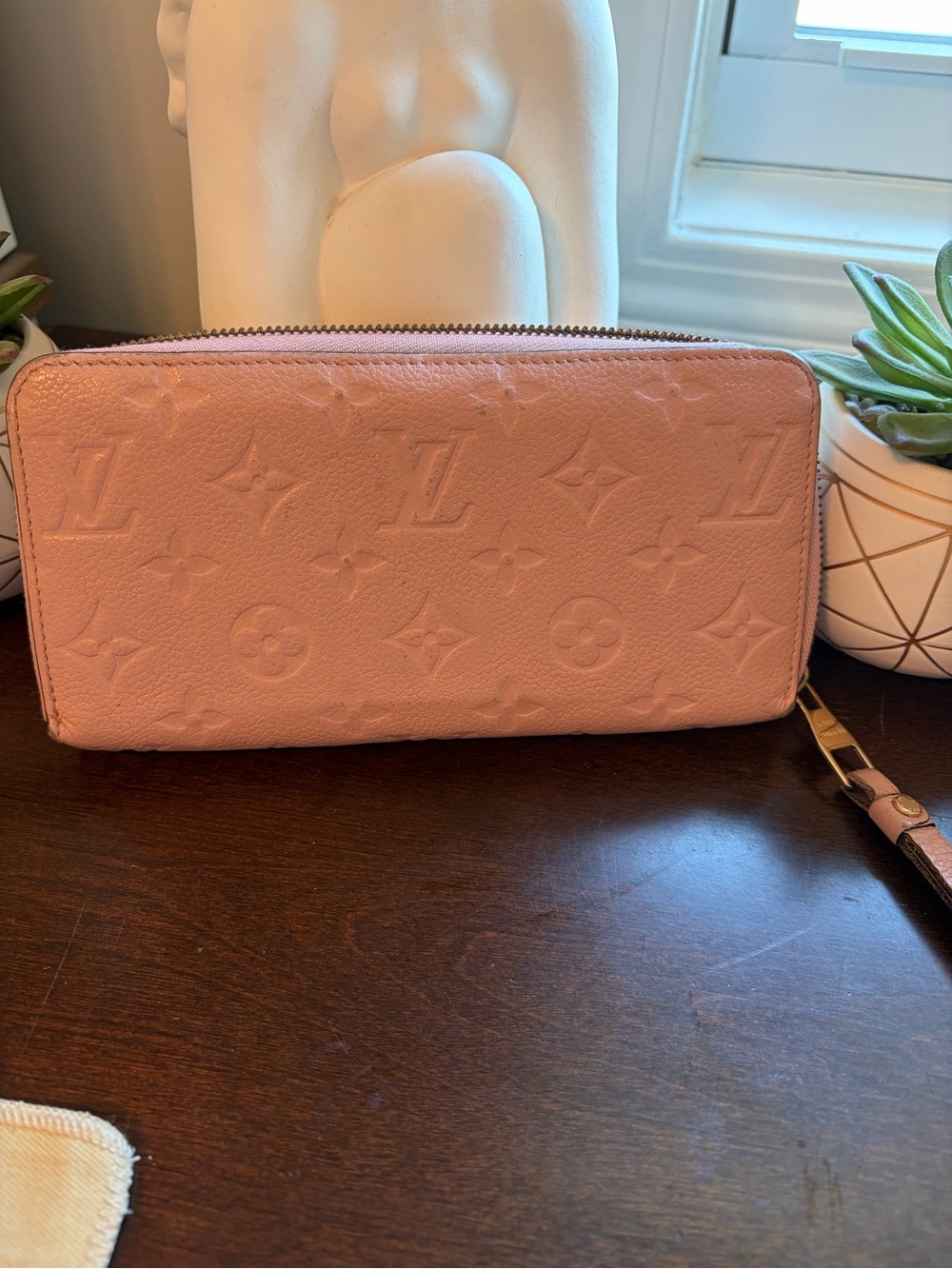 Louis Vuitton Blush Pink Embossed Monogram Zip Wallet comes with a COA
